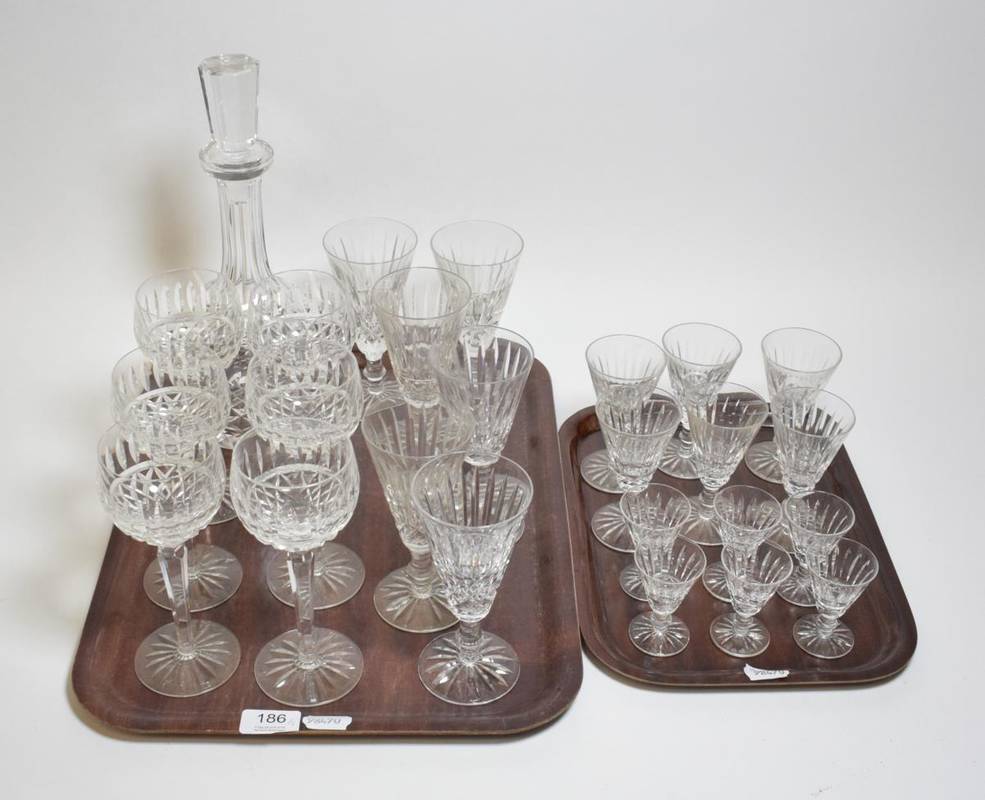 Lot 186 - Assorted glassware including Waterford crystal drinking glasses and a decanter (twenty-five pieces)
