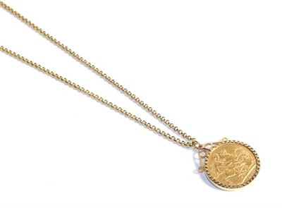 Lot 201 - A 1903 full sovereign loose mounted as a pendant in a 9 carat gold frame on a 9 carat gold...