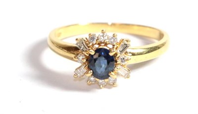 Lot 203 - An 18 carat gold sapphire and diamond cluster ring, finger size M