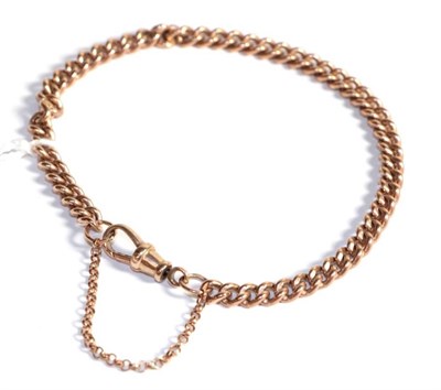 Lot 220 - A curb link bracelet, each link stamped '375', length 21.5cm