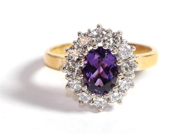 Lot 226 - An 18 carat gold amethyst and diamond ring, finger size L