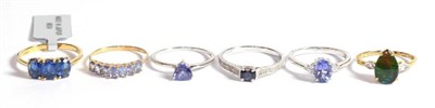 Lot 237 - Six 9 carat gold gem set dress rings including two tanzanite examples, an iolite example etc,...