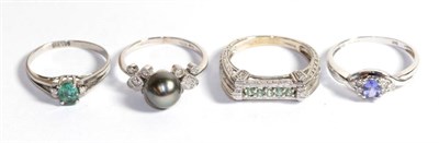 Lot 240 - Two 14 carat gold gem set dress rings including a tanzanite example; a cultured pearl dress...