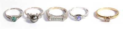Lot 241 - Six 9 carat gold gem set dress rings including an aquamarine and diamond set example, a cognac...