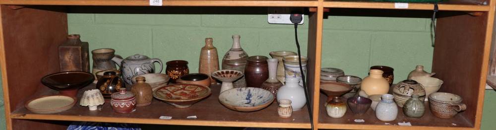 Lot 249 - A large collection of 20th century Studio Pottery, various makers and styles (39) (two shelves)