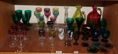Lot 267 - A group of coloured glass including Mary Gregory style beakers, hock glasses etc