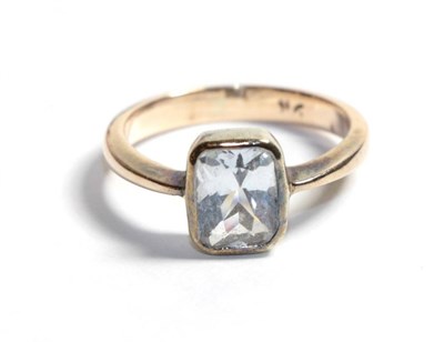 Lot 309 - A white sapphire and yellow metal ring, indistinctly marked, finger size L1/2