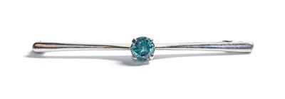 Lot 310 - A 9 carat white gold gem set bar brooch, length 5.7cm