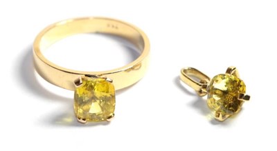 Lot 322 - A synthetic yellow sapphire ring, stamped '750', finger size P1/2; and a synthetic yellow...