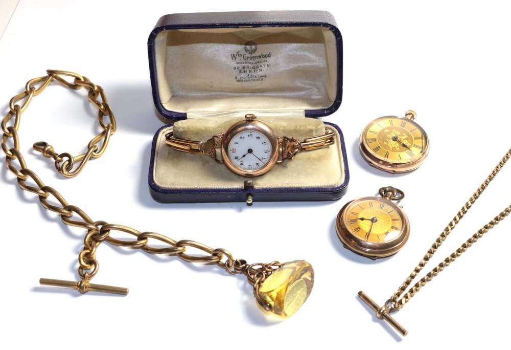 Lot 328 - A 14k fob watch; with a 9 carat lady's wristwatch; a chain with seal fob; and another watch (4)
