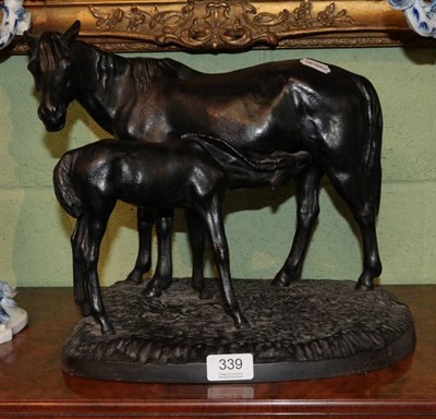 Lot 339 - A Russian patinated cast metal sculpture of a mare and foal