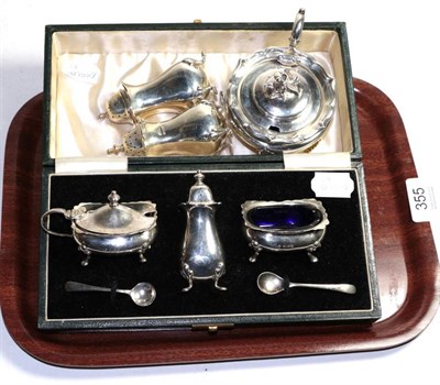 Lot 355 - A William IV silver mustard pot, Messrs Barnard, London 1837; a cased three piece condiment set, in