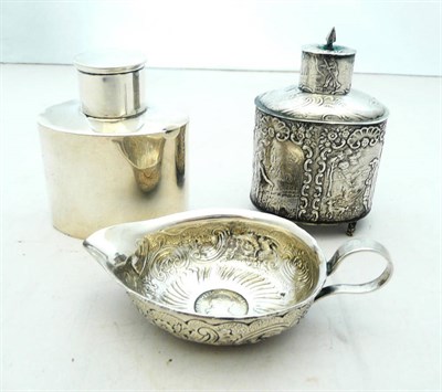 Lot 1043 - A Spanish Silver Sauceboat, circa 1776, of ovoid form, the base set with a Charles III coin...