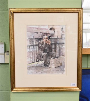 Lot 1020 - Fraser King (contemporary), Busker at Fortnams, signed, watercolour, 33cm by 26cm