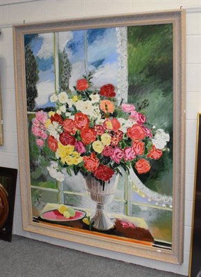 Lot 1062 - A large decorative still life of flowers in a vase by a window, oil on canvas, 188cm by 145.5cm...