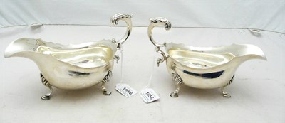 Lot 1056 - A Pair of George VI Sauceboats, Hancocks & Co Ltd, London 1937, the oval bellied bodies each raised