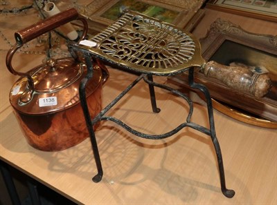 Lot 1138 - A copper kettle and a brass trivet (2)