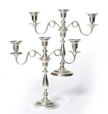 Lot 1057 - A Pair of George VI Candelabra, maker's mark BG, Birmingham 1947, the branches London 1948, the...