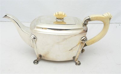 Lot 1059 - An Art Deco Silver and Ivory Teapot, maker's mark S&W, Sheffield 1937, shaped rectangular with four