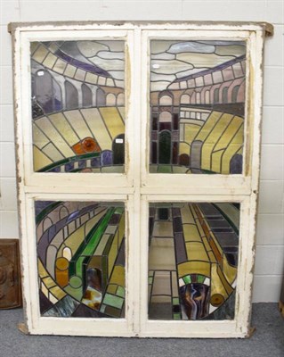 Lot 1192 - A four panel stained glass window depicting the Colosseum, Rome