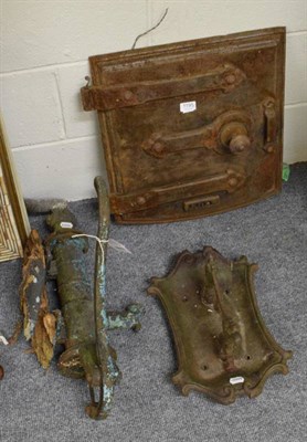 Lot 1195 - A 19th century water pump; a Victorian foot scraper; and a cast metal door from an Aga or oven
