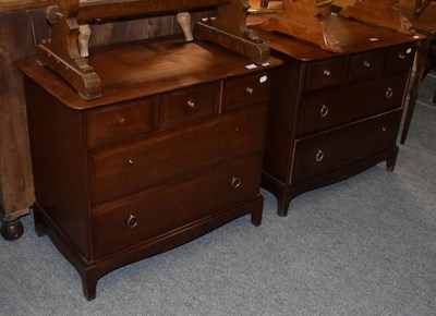 Lot 1200 - A pair of Stag minstrel mahogany chests of drawers