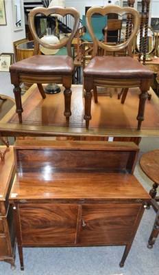 Lot 1207 - A 19th century mahogany cupboard, with hinged writing surface and a pair of mahogany wheel back...