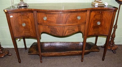 Lot 1236 - A late 19th century serpentine fronted mahogany sideboard