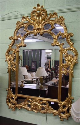 Lot 1238 - A modern gilt mirror, in the Rococo taste