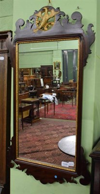 Lot 1240 - George III mahogany and parcel gilt fret cut mirror