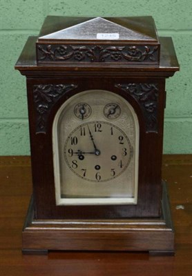 Lot 1245 - An oak cased three train mantel clock