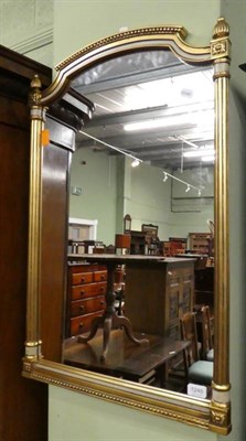 Lot 1248 - A George III demi lune fold over card table; and a modern gilt mirror (2)