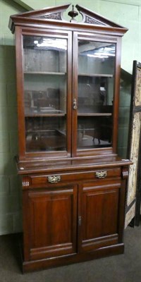 Lot 1251 - Edwardian walnut glazed bookcase