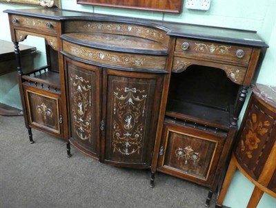 Lot 1254 - An Edwardian rosewood chiffonier base, satinwood and ivory inlay in the Sheraton style, bow...