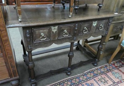 Lot 1270 - An 18th century and later oak two drawer side table