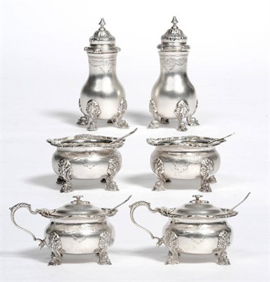 Lot 1069 - A George V Six Piece Condiment Set, Adie Bros, Birmingham 1928, in the style of Paul de...