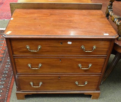 Lot 1277 - George III mahogany chest of drawers with canted corners