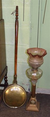 Lot 1283 - A Victorian brass column oil lamp and a bed warming pan