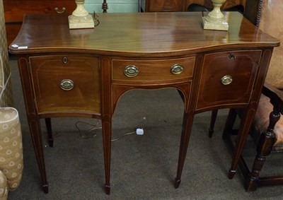 Lot 1292 - George III mahogany and inlaid serpentine fronted sideboard