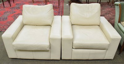 Lot 1304 - Two Multi-York cream leather armchairs