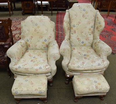 Lot 1314 - A 1950s Epstein armchair upholstered in floral fabric with matching footstool