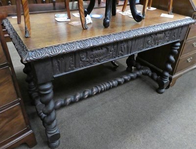 Lot 1339 - A Victorian carved oak side table