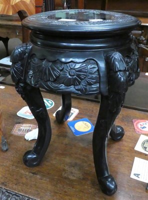 Lot 1344 - An early 20th century ebonised plant stand