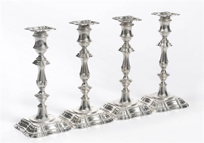 Lot 1077 - A Set of Four Edward VII Candlesticks, Fordham & Faulkner, Sheffield 1905, in 18th century...