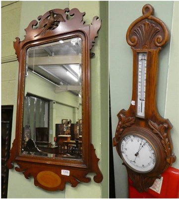 Lot 1356 - A Victorian carved oak aneroid barometer and a George III style mahogany breakfront mirror (2)