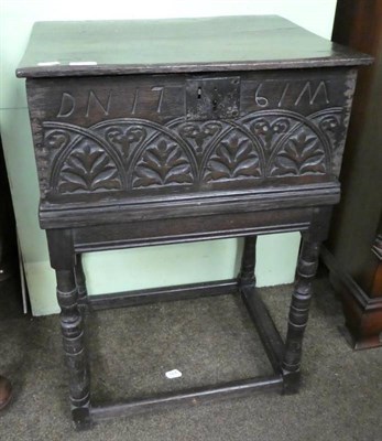 Lot 1367 - A carved oak bible box on stand dated 1767