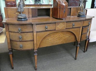 Lot 1373 - A late George III mahogany and inlaid breakfront sideboard