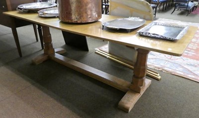 Lot 1375 - English oak trestle table, raised on faceted baluster legs