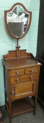 Lot 1379 - A late Victorian mahogany and satinwood banded vanity chest, with pivoting mirror