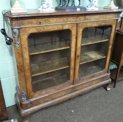 Lot 1380 - Mid-Victorian walnut and inlaid credenza with gilt metal mounts, on later stand